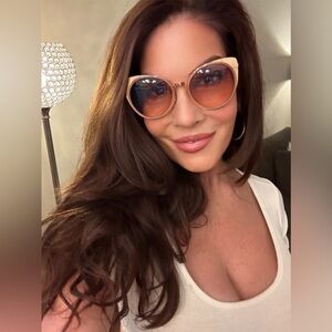 Gold framed cat eye sunglasses